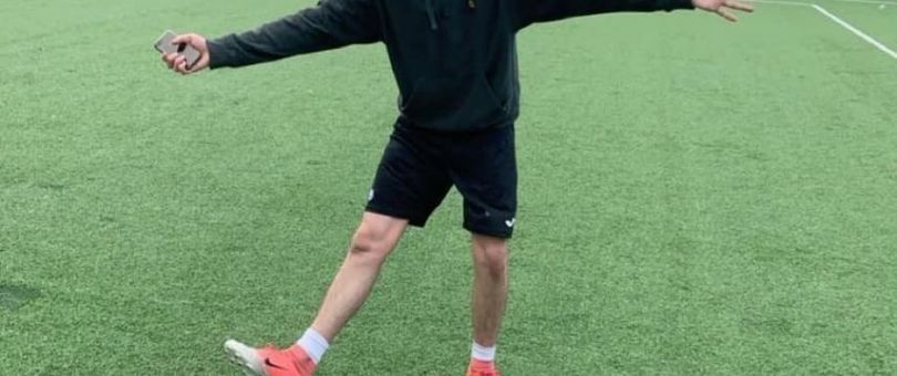 a man playing a game of frisbee