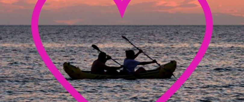 Valentines_Date_2_810_340_80_c1 a person flying a kite on the beach