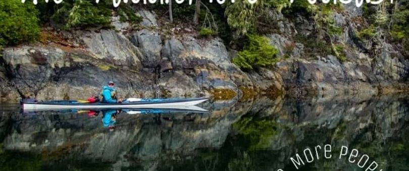a person sitting on a rock