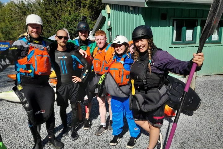 a group of people posing for the camera