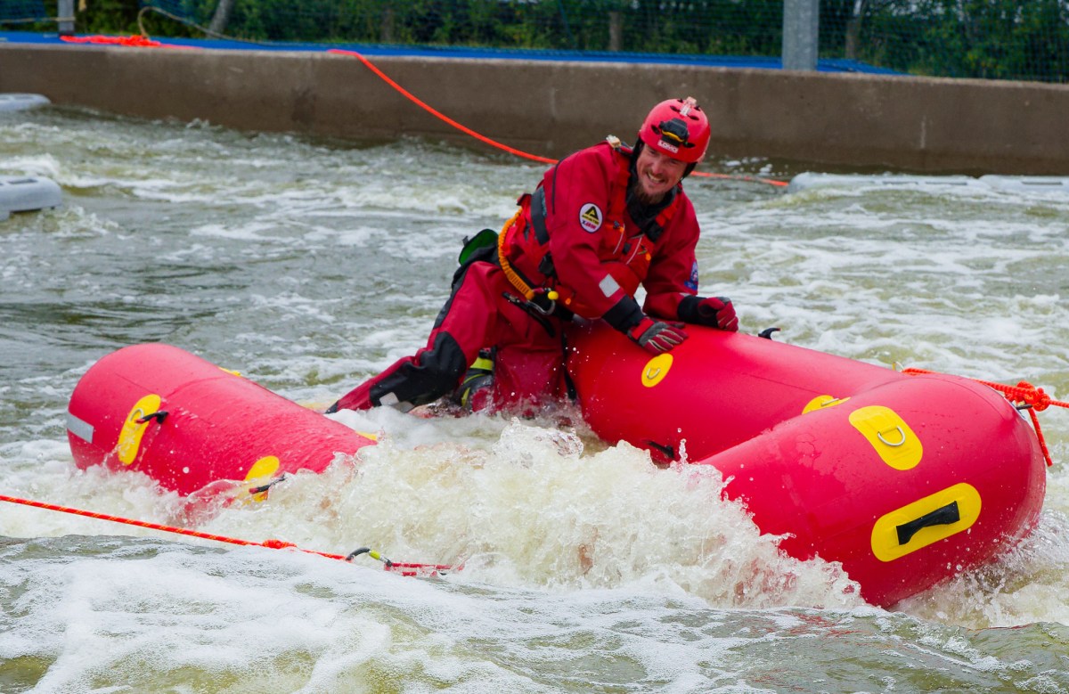 1483 a man in a raft on white water