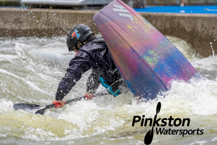 Kayaker flipping in whitewater with Pinkston Watersports logo.